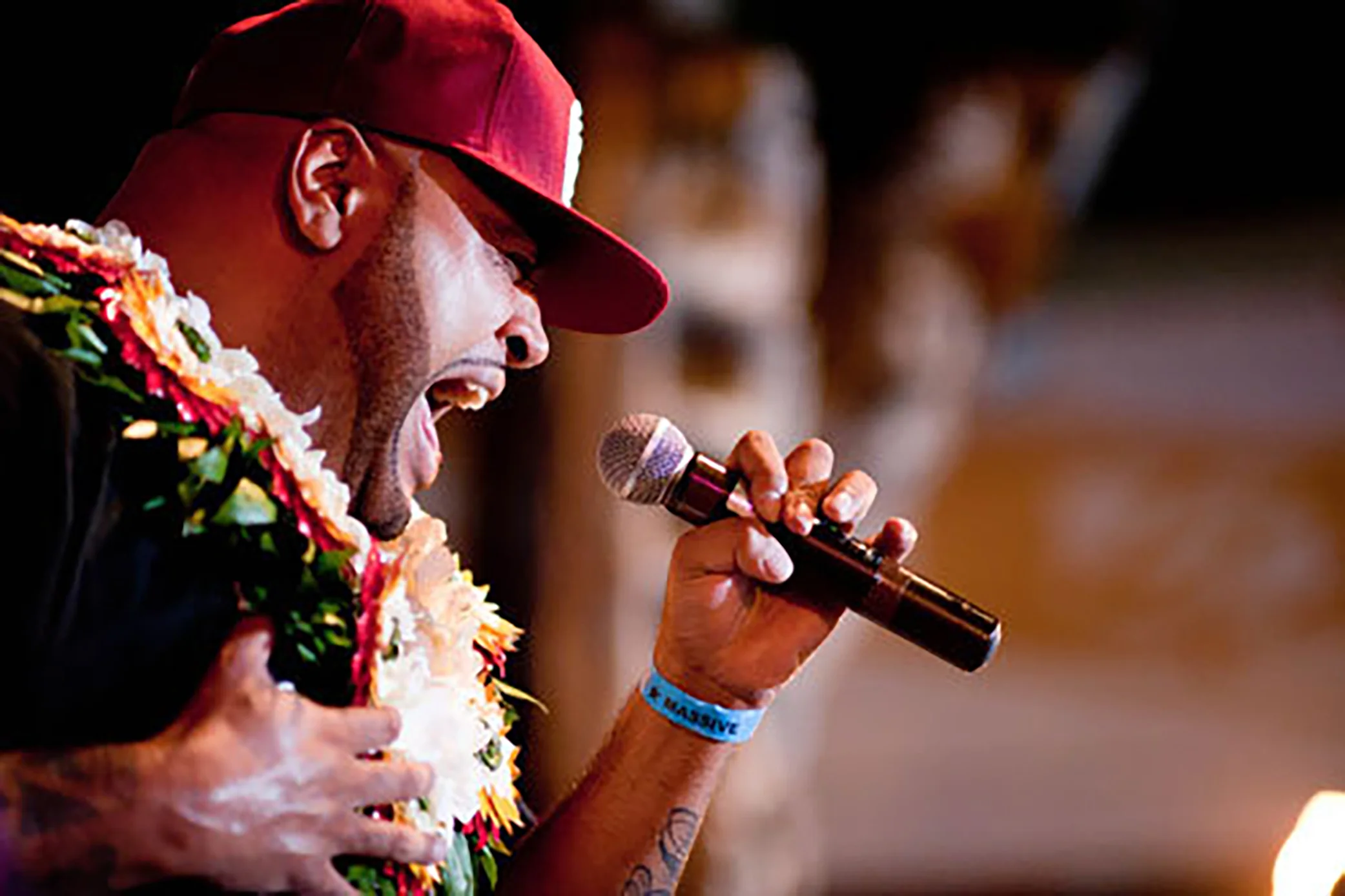 George “Fiji” Veikoso performing live with a microphone